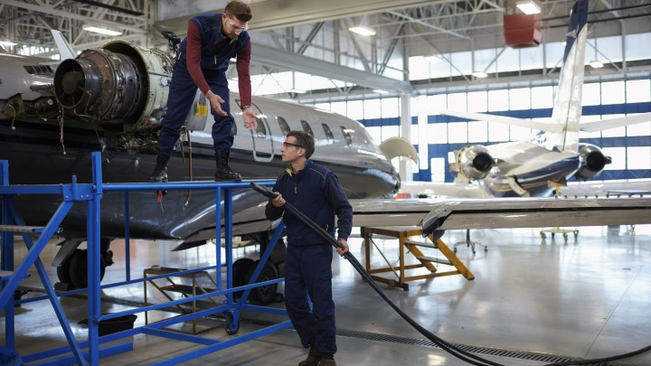 Aircraft mechanics in the hangar